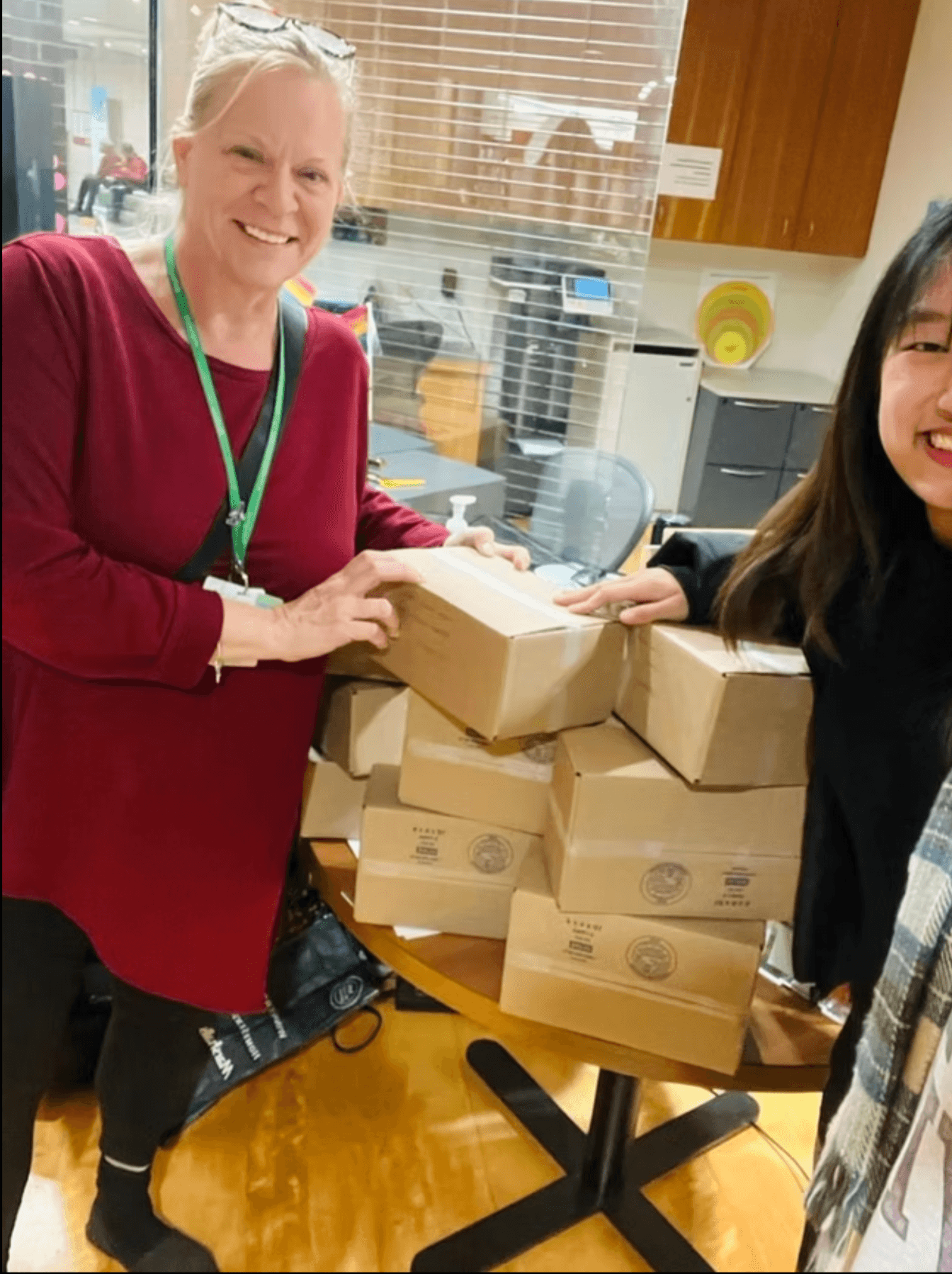 STEMSeeds kits stacked on a table during a delivery to a community partner